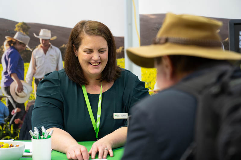RIC employee serving farmer