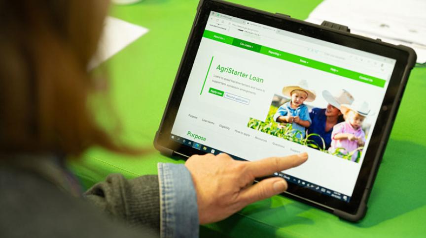 Person viewing website on tablet device.