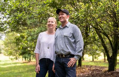 Two people looking at trees