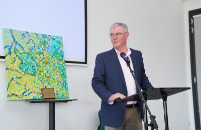 RIC CEO delivering a speech